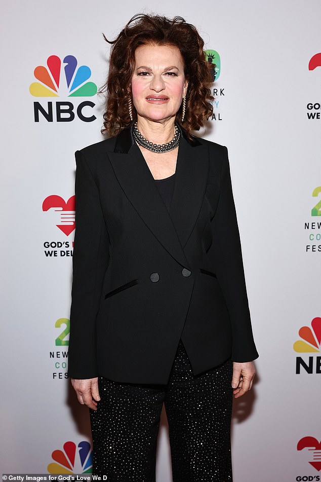 Sandra Bernhard teamed her muted black jacket and blouse with a set of sequined trousers, bringing back an air of the 1980s, when she first became a star comic