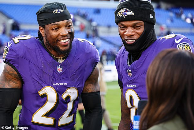 Henry's moment overshadowed the brilliance of Lamar Jackson (right) during the game