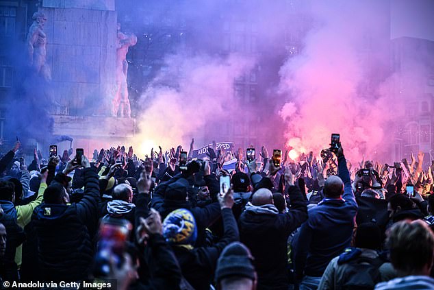 Fans of Maccabi Tel Aviv stage a pro-Israel demonstration at the Dam Square