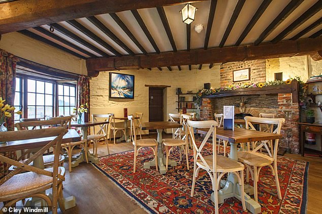 Above is Cley Windmill's breakfast and dinner venue on the ground floor of the main tower