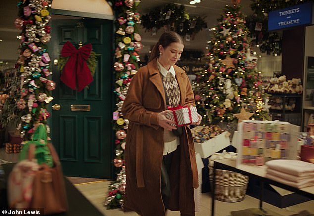 The heartwarming commercial transports viewers on a magical journey that follows a sister's (pictured) emotional quest for the perfect Christmas gift