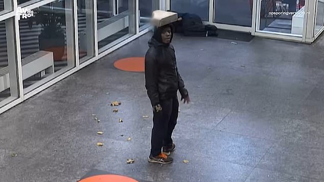 A man believed to be Levis E. is seen balancing a concrete block on his head before launching an attack