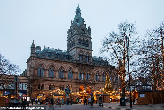 Chester's Christmas market is laid out around its Victorian Gothic town hall (above)