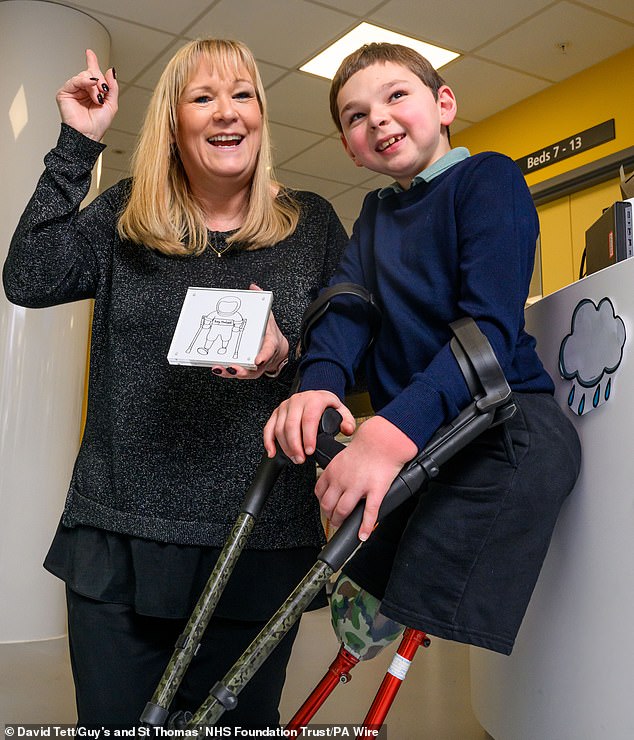 Tony was adopted by Paula and Mark Hudgell after suffering abuse at the hands of his birth parents. Tony and Paula are pictured in March