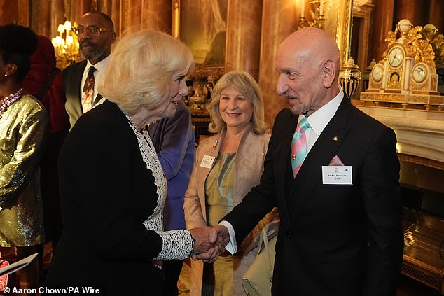 The King and Queen have hosted an array of glamorous stars at a glittering reception at Buckingham Palace to celebrate the centenary of the Film and TV Charity. Pictured, Queen Camilla with Ben Kingsley