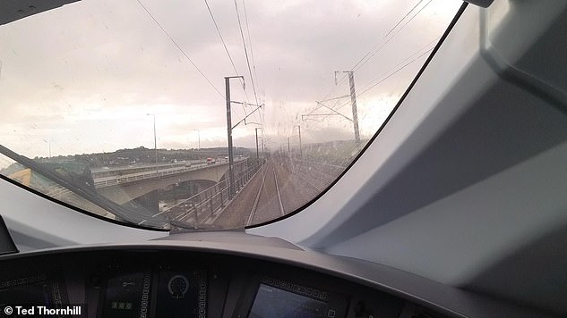 Hurtling across the Medway Viaduct at close to the maximum operating speed of 300kph (186mph)