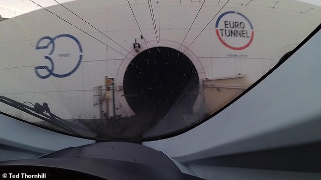 The driver's-eye view of the entrance to the Channel Tunnel on the French side. Dom tells Ted that he likes this design as it's a 'proper' round entrance, unlike the rectangular one on the UK side