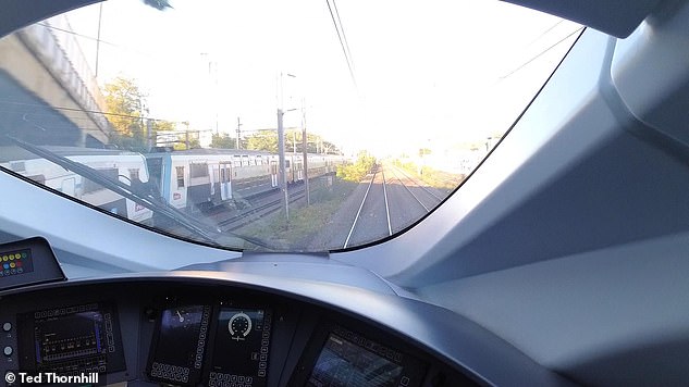 We briefly 'race' a local service on the line out of Gare du Nord