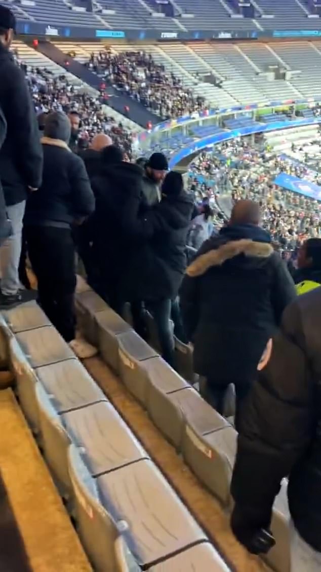 A mobile phone recording shows the moment chaos erupted in the Stade de France, which onlookers have accused the away side's fans of starting