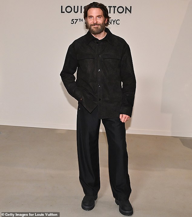 Bradley Cooper put on a stylish display of his own wearing a long-sleeved, black button up as well as a pair of black, loose-fitting trousers