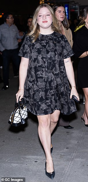 Francesca Scorsese wore a short-sleeved, gray dress that had a teddy bear pattern embroidered on the material