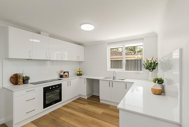 The newly renovated kitchen looked bright and fresh