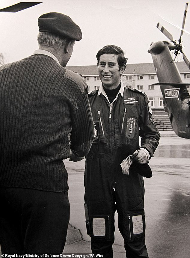 King Charles III, the then Prince of Wales, in his flying overalls having landed his Wessex V Helicopter on the parade ground at the Commando Training Centre Royal Marines