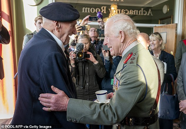 King Charles meets D-Day veteran Norman Ashford, a coxswain on a landing craft who did numerous runs up Gold Beach