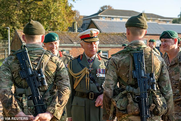 The King, who is Captain General of the Royal Marines, met his troops (pictured) and presented the King's Badge and a Green Beret to two trainees, Osian Stephens from Colwyn, North Wales and Joseph Ryan from Merseyside