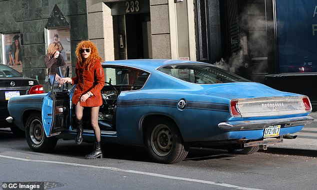 Lyonne was spotted getting out of an old blue sports car on the set