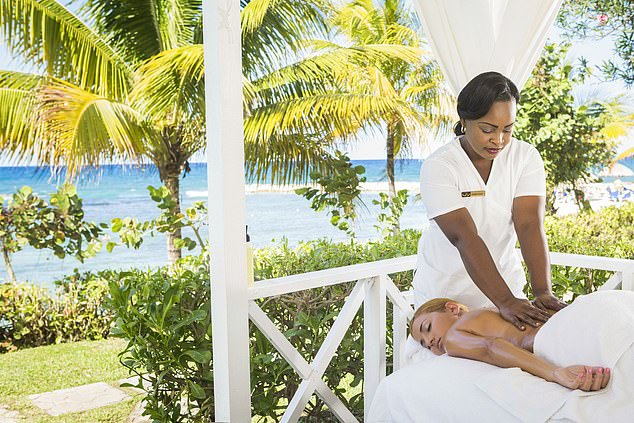 Guests can treat themselves to a relaxing massage by the ocean (file image)