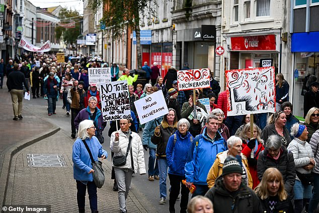 A huge crowd marches through Weymouth Town Centre in protest against the incinerator