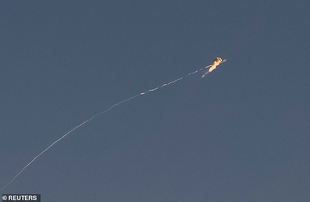 An explosion of a missile is seen in the sky over the city during a Russian missile strike, amid Russia's attack on Ukraine, in Kyiv, Ukraine November 17, 2024