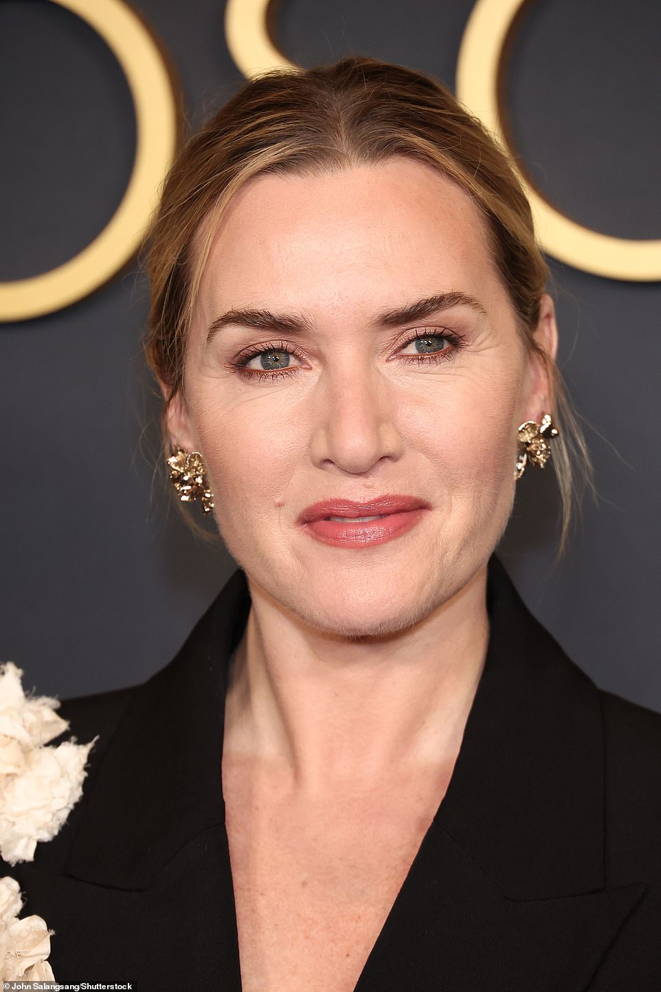 The Titanic star accessorized with chunky gold earrings