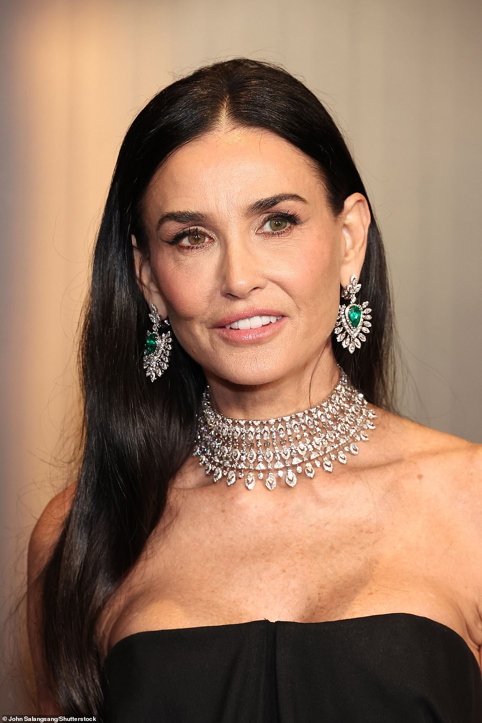 She accessorized the look with statement-making diamond jewelry