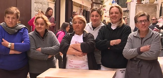 Nunzia Caputo (centre) was among the pasta makers who refused to make and sell their wares this weekend