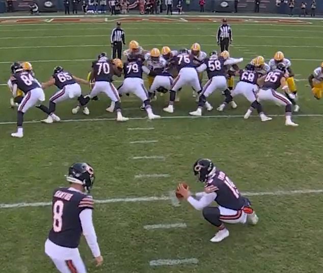 It did appear that the Packers made contact with Chicago long snapper Karl Brooks (center)