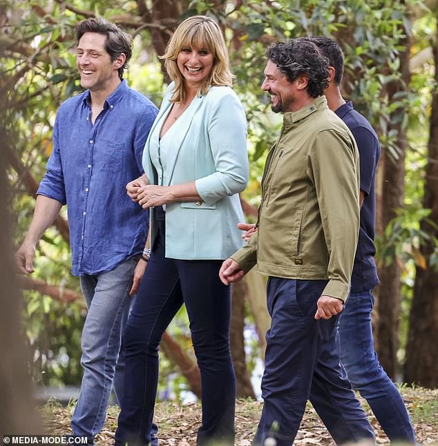 Johanna revealed her décolletage in the low-cut top as she filmed scenes with Colin Fassnidge, Charlie Albone and Adam Dovile