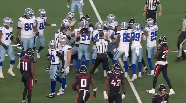 A mass brawl broke out on the field during the game between the Cowboys and Texans