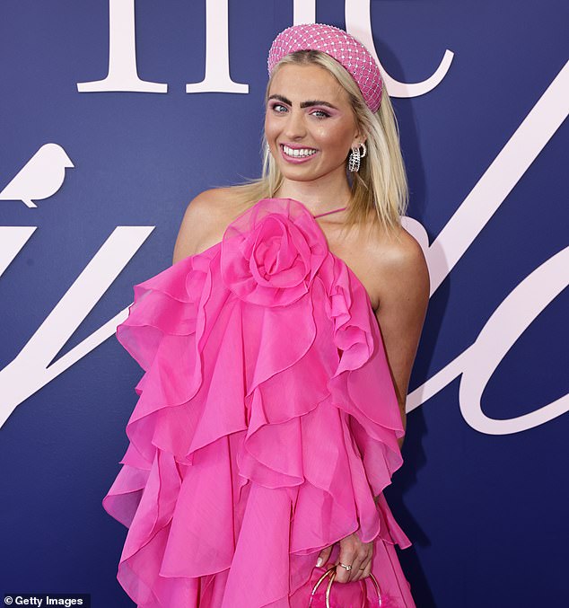 Leary (pictured at this year's Melbourne Cup) said she was 21 when she tried to take her own life but was interrupted by a stranger