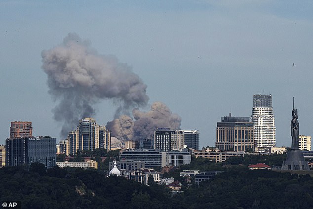 File. Smoke rises over Kyiv after a Russian attack. The city is again bracing for a strike