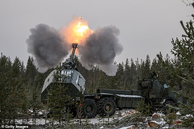 A Swedish artillery team fires a projectile from an Archer self-propelled Howitzer during the NATO 'Exercise Lightning Strike' on November 20, 2024 near Heinu, Finland. The live-fire exercise includes service members from 28 Allied and partner nations, and is taking place between November 4 to November 24, across locations in Finland, Estonia, Germany, Poland, and Romania