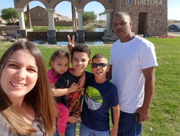 Ms Pratt is pictured above with her family. She said she was hospitalized for three days after struggling with the illness for two weeks