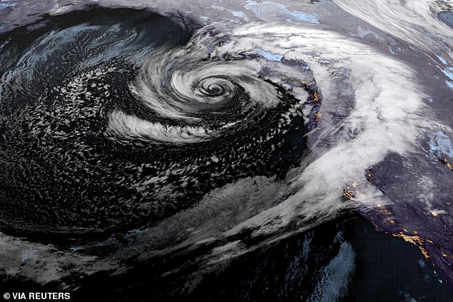 The bomb cyclone is moving off the coast of the Pacific Northwest, but has ushered in an atmospheric river that will continue to hammer western states with storm conditions