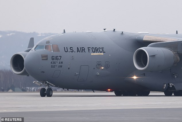 Above, a USAF C-17 carrying US troops arrives at Rzeszow-Jasionka Airport, Poland in 2022