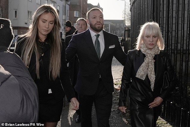 McGregor arrives with his partner and parents