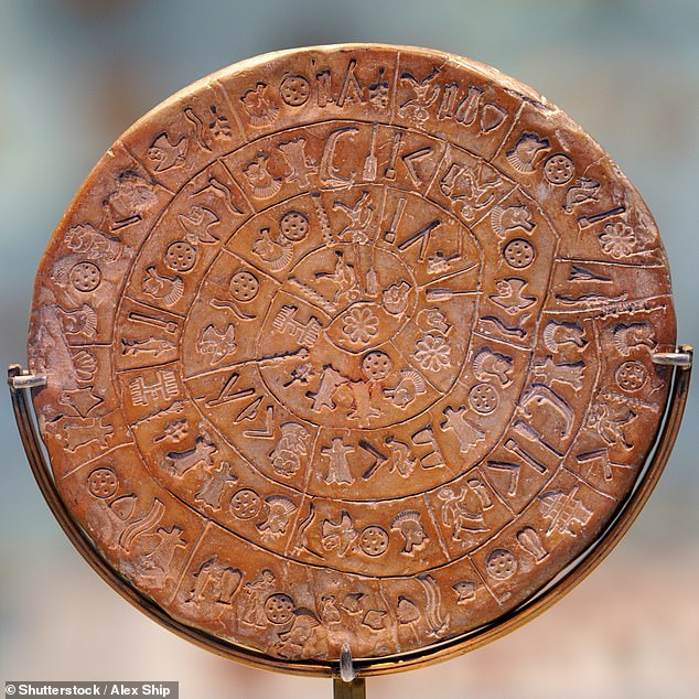 The 3,000-year-old Phaistos Disk (pictured) is believed to have been made by the Minoan civilisation on the island of Crete. It contains 241 prints showing 45 different symbols divided into 'words' but no translation has yet been found