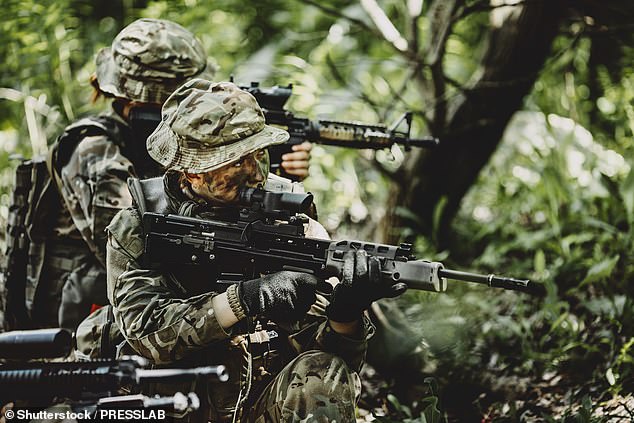 Robert Jenrick, the Shadow Secretary of State for Justice, said that SAS soldiers were forced to killed terrorists rather than capture them as the 'European Court will set them free (file image of special forces soldiers during military maneuver)