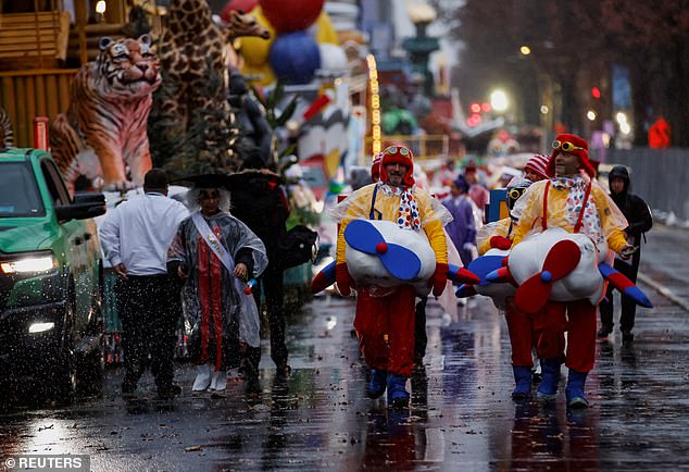 The annual holiday tradition started at 8:30 a.m. ET as a low pressure system moved through the area bringing wind, rain and plunging temperatures