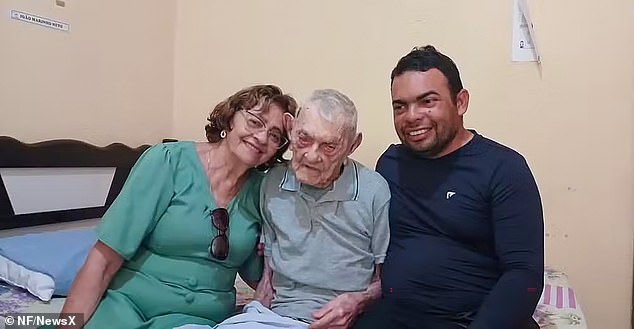 Joao pictired with his family in  an undated photo. He has said that the secret to long life is 'being surrounded by good people and keeping his loved ones close by'