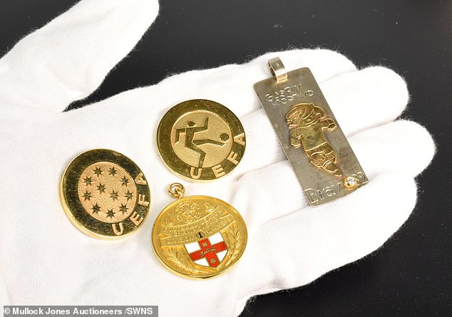 A selection of medals and trophies previously belonging to Shaw have been put up for auction