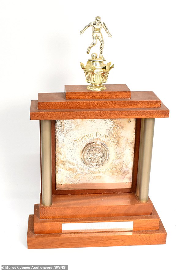 Shaw's PFA Young Player of the Year trophy from 1981 is among the items in the collection