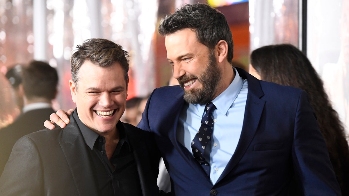 Matt Damon and Ben Affleck arrive at an event