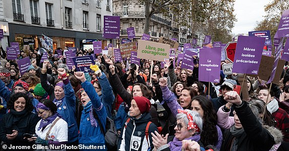 Mandatory Credit: Photo by Jerome Gilles/NurPhoto/Shutterstock (14938298w) Demonstrators hold placards as they walk during a protest to condemn violence against women, called by feminist organizations, in Paris, France, on November 23, 2024, two days prior to the International Day for the Elimination of Violence against Women. March Against Violence Against Women In Paris, France - 23 Nov 2024