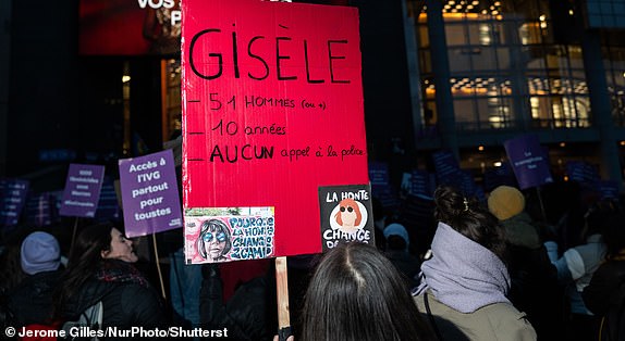 Mandatory Credit: Photo by Jerome Gilles/NurPhoto/Shutterstock (14938298ar) A demonstrator holds a placard reading ''Gisele, 51 men, 10 years old, no police call.'' during a protest to condemn violence against women, called by feminist organizations in Paris, France, on November 23, 2024, two days prior to the international day for the elimination of violence against women. March Against Violence Against Women In Paris, France - 23 Nov 2024