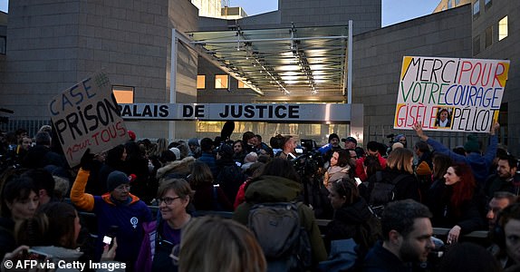 Journalists wait to enter the courthouse in Avignon on December 19, 2024, as the verdict is expected in the trial of a man, with 50 others, accused of drugging his wife and orchestrating multiple rapes over nearly a decade. A court in the French southern town of Avignon is trying Dominique Pelicot, a 71-year-old retiree, for repeatedly raping and enlisting dozens of strangers to rape his heavily sedated wife Gisele Pelicot in her own bed over a decade. Fifty other men, aged between 26 and 74, are also on trial for alleged involvement, in a case that has horrified France. (Photo by Sylvain THOMAS / AFP) (Photo by SYLVAIN THOMAS/AFP via Getty Images)