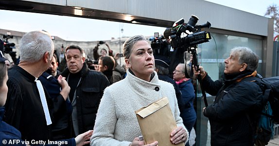 Caroline Darian arrives at the courthouse in Avignon on December 19, 2024, as the verdict is expected in the trial of her father, with 50 others, accused of drugging his wife and orchestrating multiple rapes over nearly a decade. A court in the French southern town of Avignon is trying Dominique Pelicot, a 71-year-old retiree, for repeatedly raping and enlisting dozens of strangers to rape his heavily sedated wife Gisele Pelicot in her own bed over a decade. Fifty other men, aged between 26 and 74, are also on trial for alleged involvement, in a case that has horrified France. (Photo by Sylvain THOMAS / AFP) (Photo by SYLVAIN THOMAS/AFP via Getty Images)