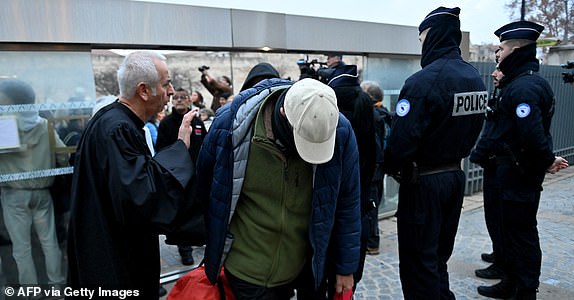 One of the defendant arrives at the courthouse in Avignon on December 19, 2024, as the verdict is expected in the trial of a man, with 50 others, accused of drugging his wife and orchestrating multiple rapes over nearly a decade. A court in the French southern town of Avignon is trying Dominique Pelicot, a 71-year-old retiree, for repeatedly raping and enlisting dozens of strangers to rape his heavily sedated wife Gisele Pelicot in her own bed over a decade. Fifty other men, aged between 26 and 74, are also on trial for alleged involvement, in a case that has horrified France. (Photo by Sylvain THOMAS / AFP) (Photo by SYLVAIN THOMAS/AFP via Getty Images)