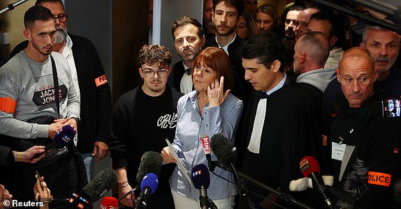 Frenchwoman Gisele Pelicot, the victim of an alleged mass rape orchestrated by her then-husband Dominique Pelicot at their home in the southern French town of Mazan, talks to journalists after the verdict in the trial for Dominique Pelicot and 50 co-accused, at the courthouse in Avignon, France, December 19, 2024. REUTERS/Manon Cruz