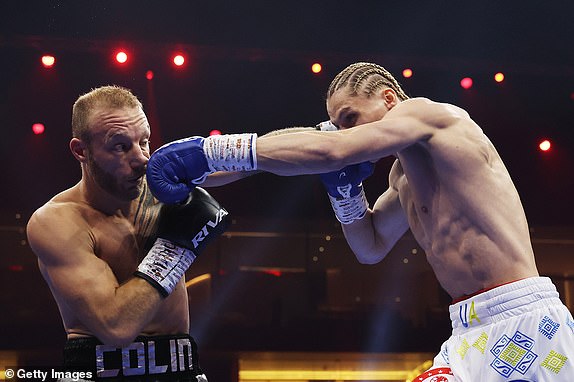 RIYADH, SAUDI ARABIA - DECEMBER 21: Daniel Lapin punches Dylan Colin during the IBF International Light Heavyweight fight between Daniel Lapin and Dylan Colin as part of Oleksandr Usyk v Tyson Fury 2, Reignited card at Kingdom Arena on December 21, 2024 in Riyadh, Saudi Arabia. (Photo by Richard Pelham/Getty Images)